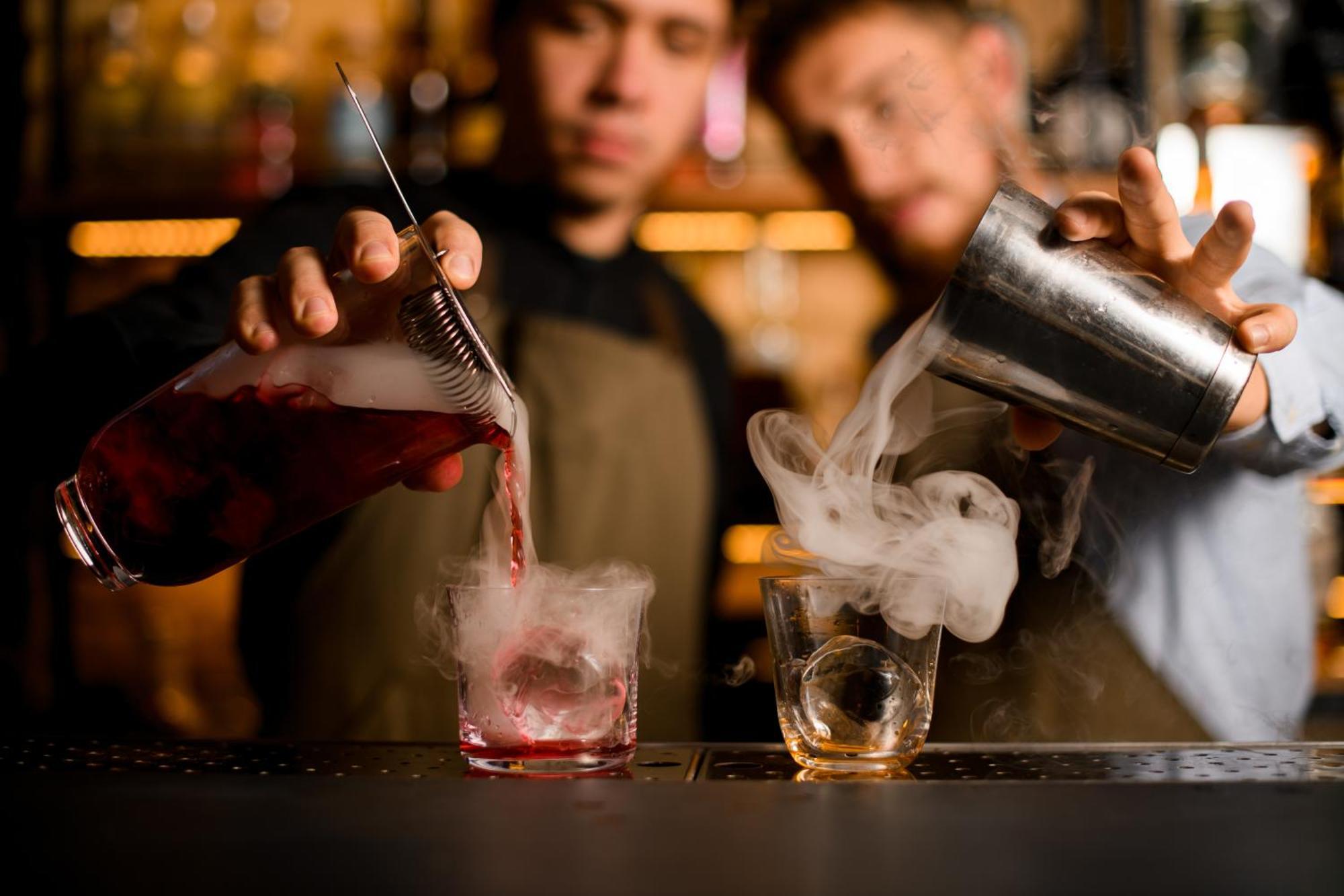Waldorf Astoria Ras Al Khaimah Luaran gambar A bartender mixing a cocktail